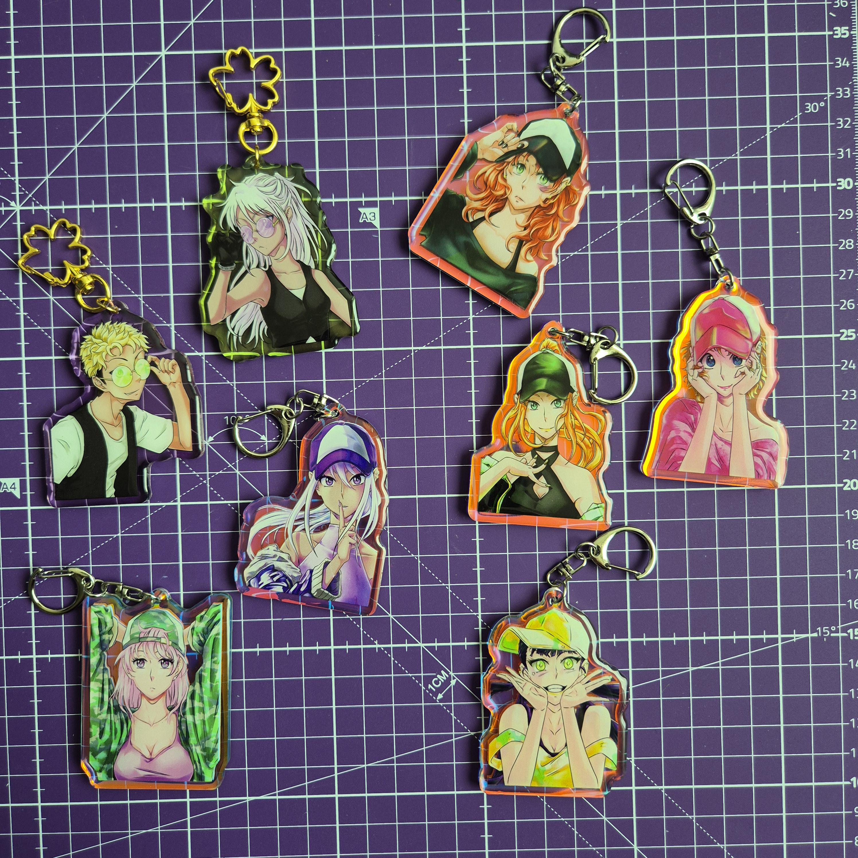 Aoi & Kenji Sonnenbrillen, Schlüsselanhänger mit doppel Epoxy, farbig transparent mit Blumenverschluss