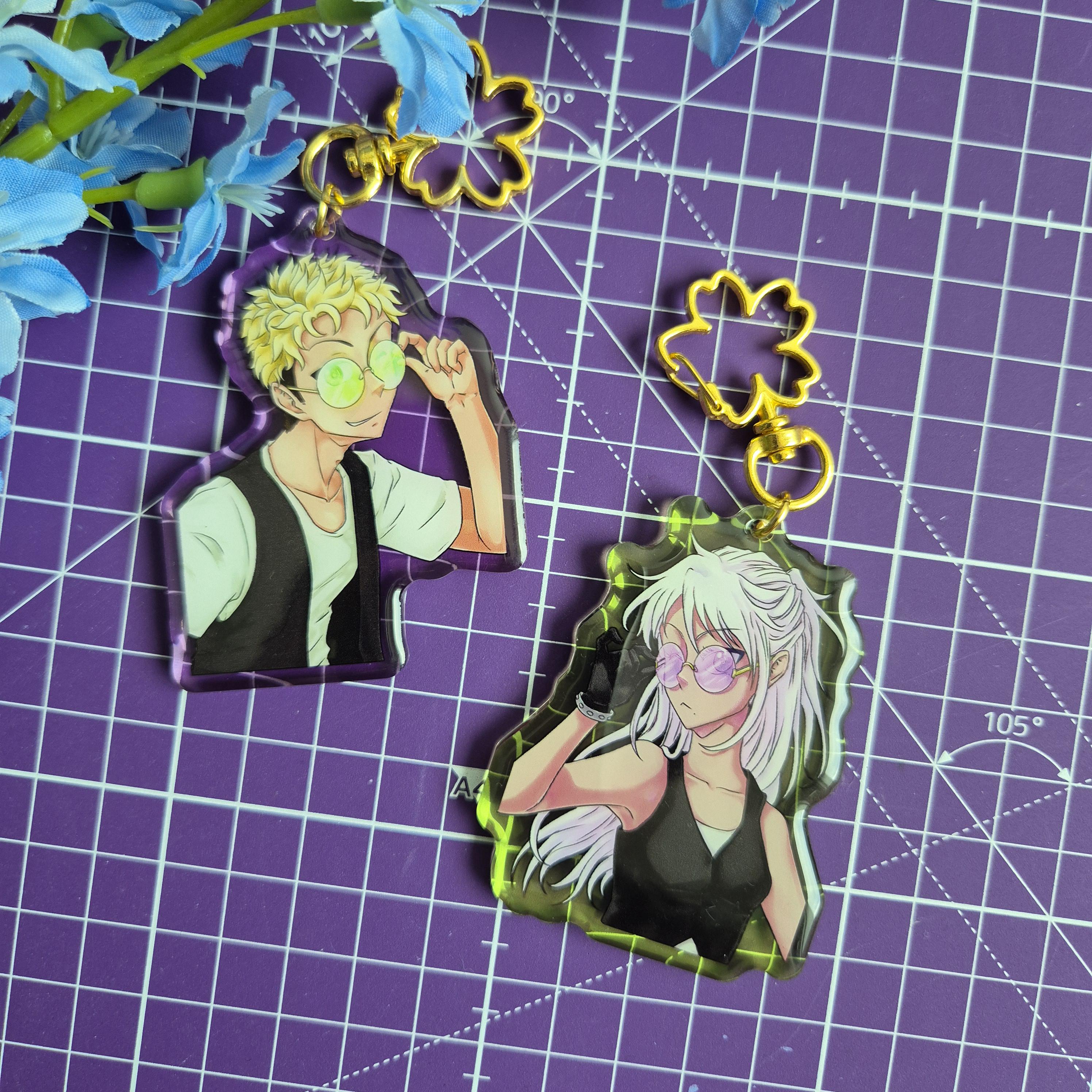 Aoi & Kenji Sonnenbrillen, Schlüsselanhänger mit doppel Epoxy, farbig transparent mit Blumenverschluss